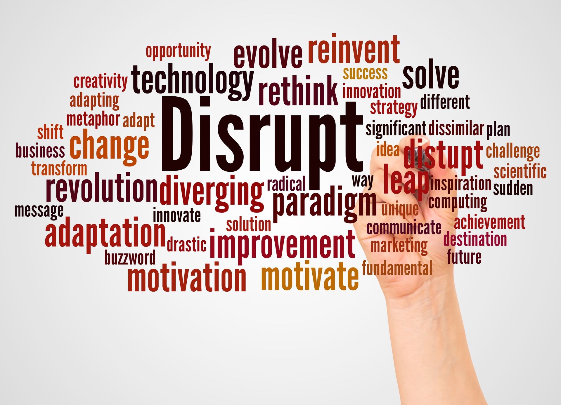 Disrupt word cloud and hand with marker concept on white background.